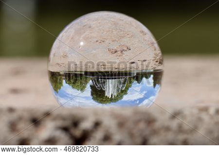 Water Fountain In Dusseldorf Nordpark, Germany, Europe, Seen In Crystal Ball