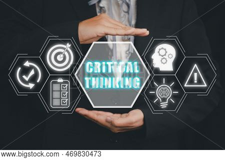 Critical Thinking Concept, Business Person Hand Holding Critical Thinking Icon On Virtual Screen, Bu