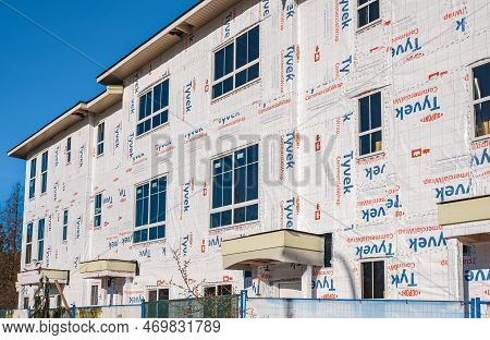 New Low-rise Apartments Building Construction. Housing Construction In Surrey Canada. Residential Bu