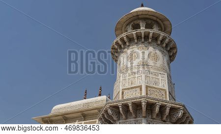 The Ancient Mausoleum -the Grave Of Itmad-ud-daul. Marble Minaret Against The Blue Sky. Balconies, S