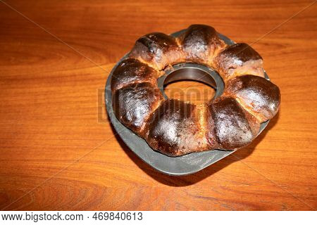 Burnt Cake On Wooden Table Brioche Cakes Overcooked In Charred Oven