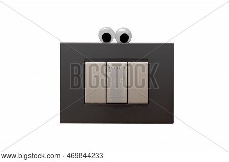 Wall Switch On A White Background With Googly Eyes