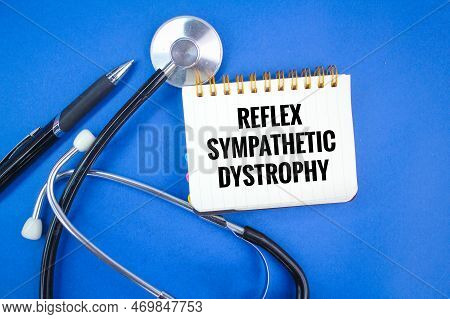 Stethoscope, Pen And Notebook With The Words Reflex Sympathetic Dystrophy