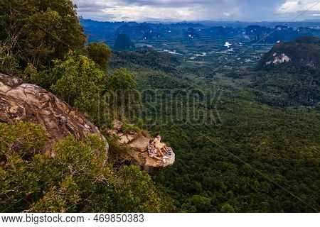 Couple At The Edge Of A Mountain, Dragon Crest Mountain Krabi Thailand