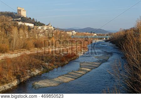 Drome River Near The City Of Crest With The Tower Over The Town
