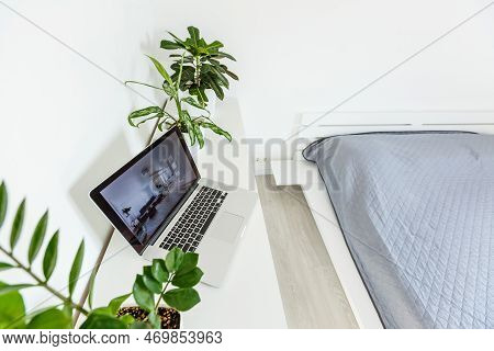 Office Tabletop With Tablet, Laptop Showing Cool Hotel Responsive Design Website