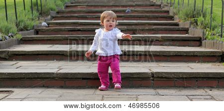 Baby girl on stairs