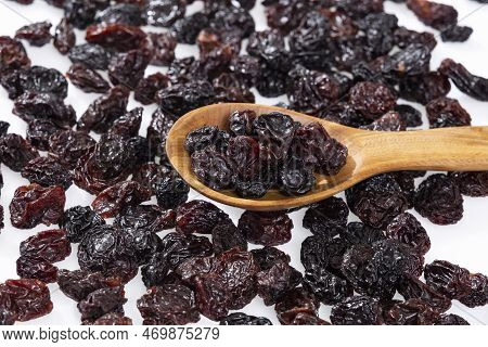 Healthy Food - Nuts Dehydrated Grapes; Photo White Background