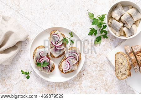 Herring Sandwich. Open Sandwiches With Whole Grain Bread, Herring And Onion. Top View