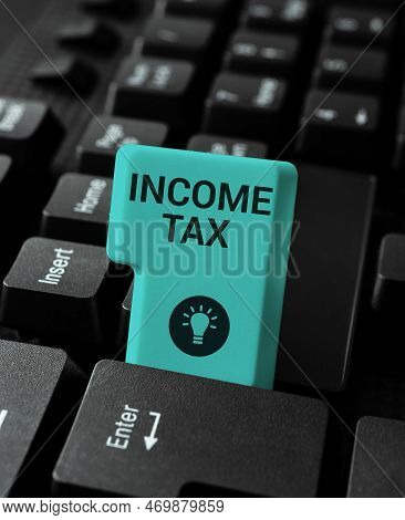 Writing Displaying Text Income Tax. Business Overview Annual Charge Levied On Both Earned And Unearn