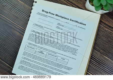 Concept Of Sba Form Drug-free Workplace Certification Isolated On Wooden Table.