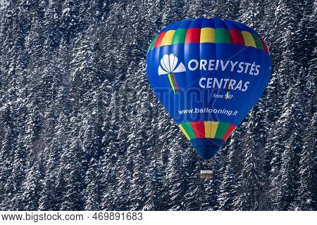 Chateau-d'oex,vaud, Switzerland - 23 January 2023: Hot Air Balloon In Flight. Oreivystes Centras Hot