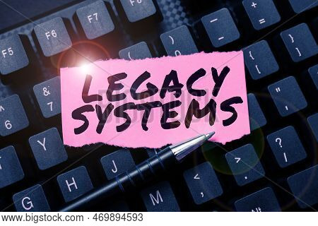 Text Caption Presenting Legacy Systems. Conceptual Photo Old Method Technology Computer System Or Ap