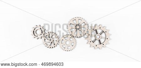 Gears. Gear Wheel. Mechanisms Are Interconnected By Themselves. On A White Background. The Concept O