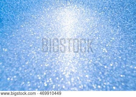 Christmas Blue Glowlight Blur Bokeh Abstract Background.concept For Happy Holiday New Year Festive G