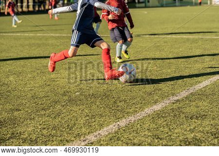 Stock Image Kid Game Football. Difocused Image