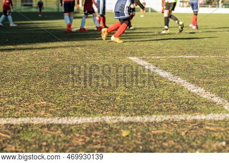 Stock Image Kid Game Football. Difocused Image