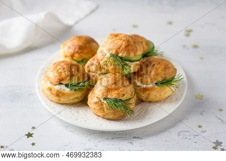 Cheese Profiteroles With Cream Cheese, Cucumber And Herbs, Gougeres, Traditional French Pastries, In