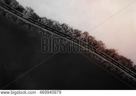 Road Among The Lake Drone Shot Grayscale