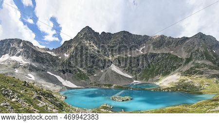 Panoramic View Of Big Imeretinsky Lake Or Lake Of Silence At Mountains Background In Karachay-cherke