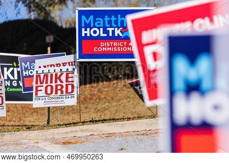 Dacula, Ga / Usa - November 8, 2022:  Election Campaign Yard Signs Dominate The Landscape At A Georg