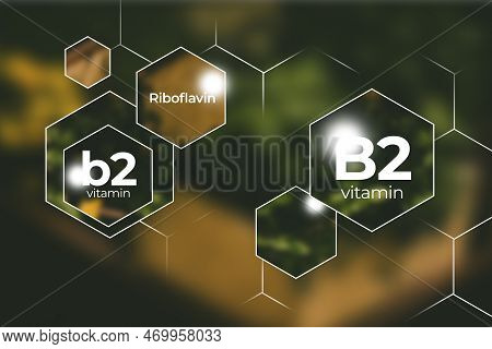 Molecular Model Of Vitamin B2, Riboflavin. Hexagons With Vitamin B2 Name, Blurry Background.