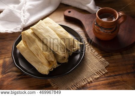 Tamales. Prehispanic Dish Typical Of Mexico And Some Latin American Countries. Corn Dough Wrapped In