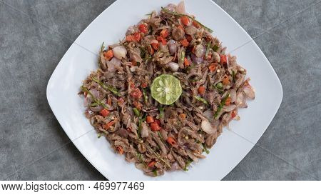 Chicken Or Beef With Traditional Indonesian Sambal. Onions, Chilies, Coconut Oil, Lime Leaves, Salt.