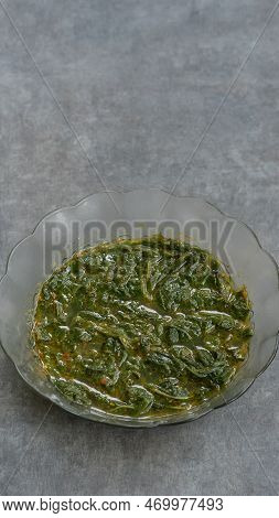 Cassava Leaf Vegetable Curry Served With A Mixture Of Indonesian Spices.