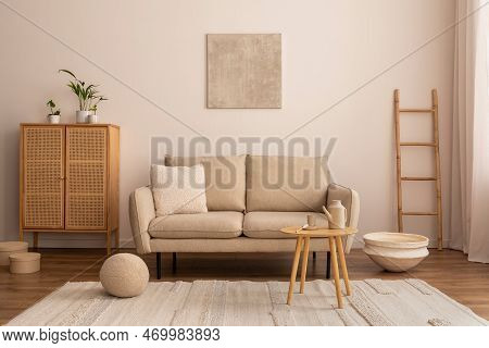 Interior Design Of Cozy Living Room Interior With Mock Up Poster Frame, Beige Sofa, Rattan Commode, 