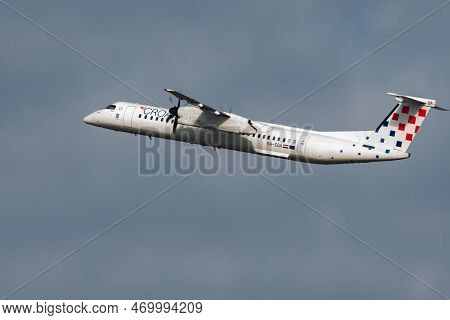 Zurich, Switzerland, January 20, 2023 Croatia Airlines Bombardier Dash 8-q402 Propeller Plane Taking