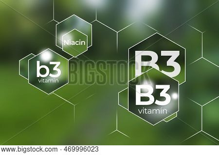 Molecular Model Of Vitamin B3, Niacin. Hexagons With Vitamin B3 Name, Blurry Background.