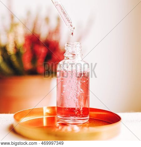 Pipette And Transparent Bottle With Serum, Gel, Oil Or Other Cosmetic Product. Trendy Selfcare Beaut