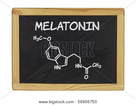 chemical formula of melatonin on a blackboard