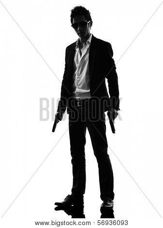 one asian gunman killer  standing in silhouette isolated white background