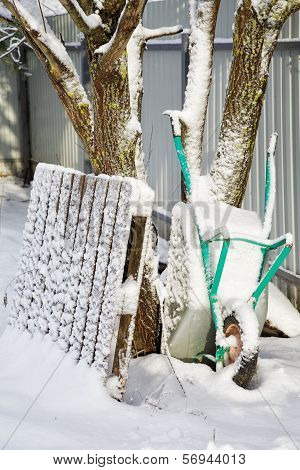 Garden Cart Brought By Snow In The Winter Afternoon
