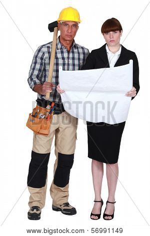 Tradesman and engineer working together