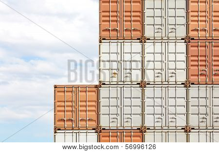 Stacked cargo containers in storage area of freight sea port terminal