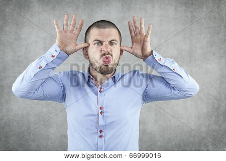 Funny Businessman Playing On The Nerves Of The Boss