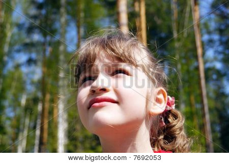 The girl looking upwards