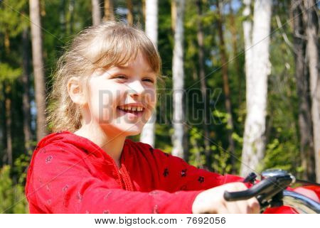 Teenage girl on a bicycle