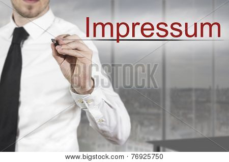 Businessman Writing Impressum In The Air