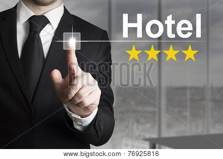 Businessman Pushing Button Hotel Four Star Rating