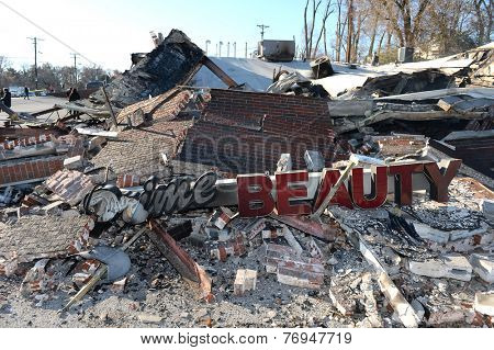 FERGUSON, MO/USA - NOVEMBER 25, 2014: Smoldering remains of Prime Beauty Supply in Ferguson in the aftermath of riots after announcement of Grand Jury decision