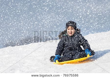 Sledding At Winter Time