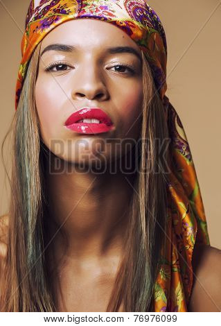 beauty young happy afro american woman in shawl on head