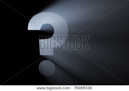 Question Mark. Hole cut in cardboard, smoke machine and spotlight. The image may appear noisy, but that is the texture of the smoke.
