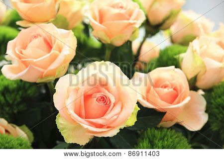 Yellow with orange roses