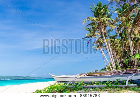 Tropical White Beach View And Lonely Sailboat Near Palm Trees And Turquoise Sea
