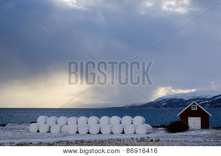 Stack of hay bales in North of Norway